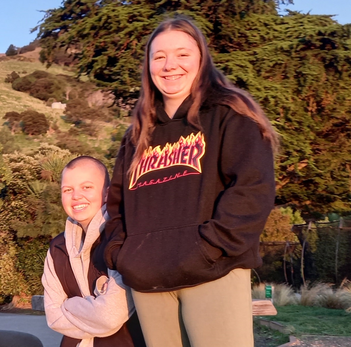 two young people smiling 