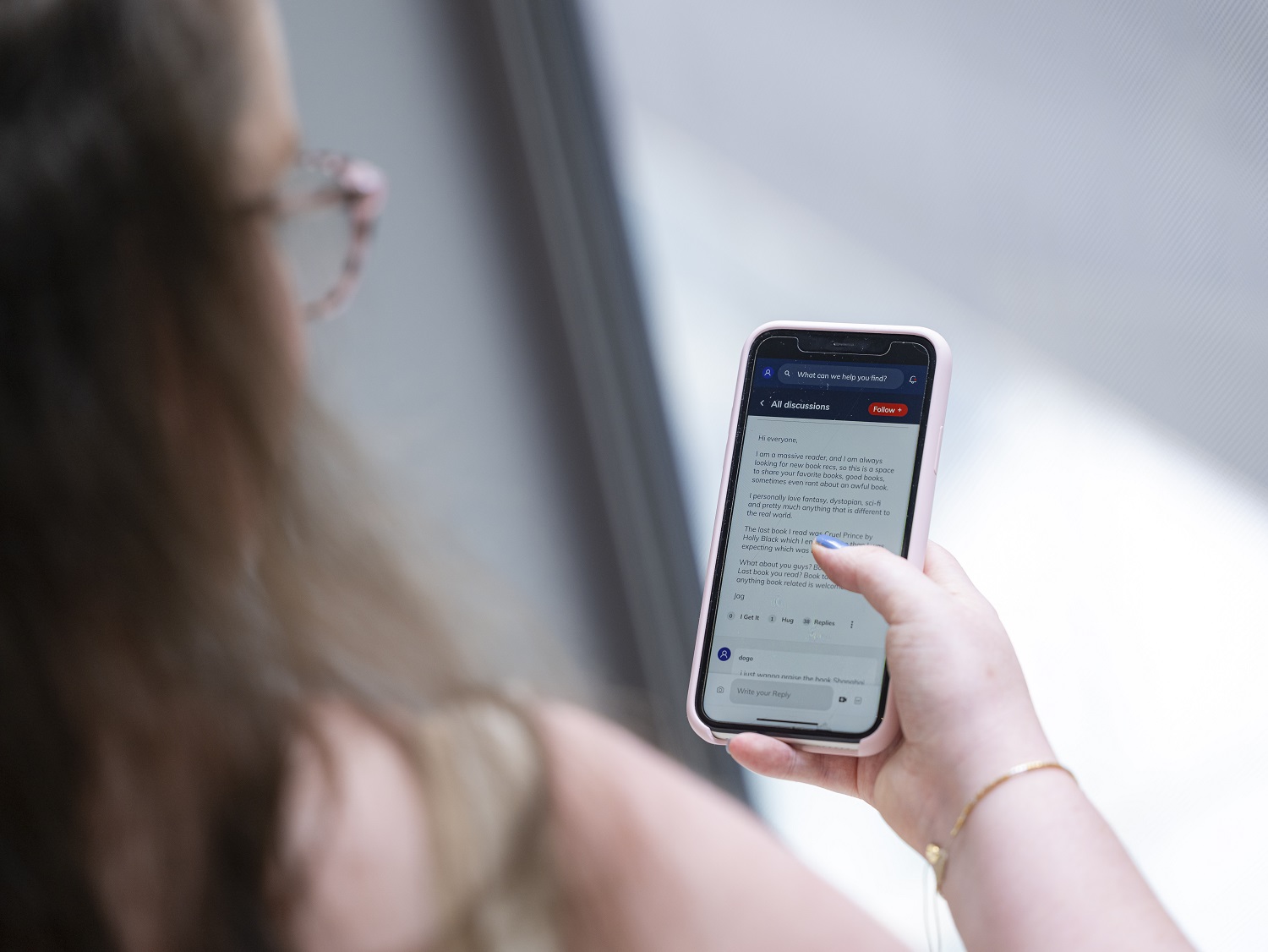 young person using their phone to access online events as part of Canteen's cancer support community